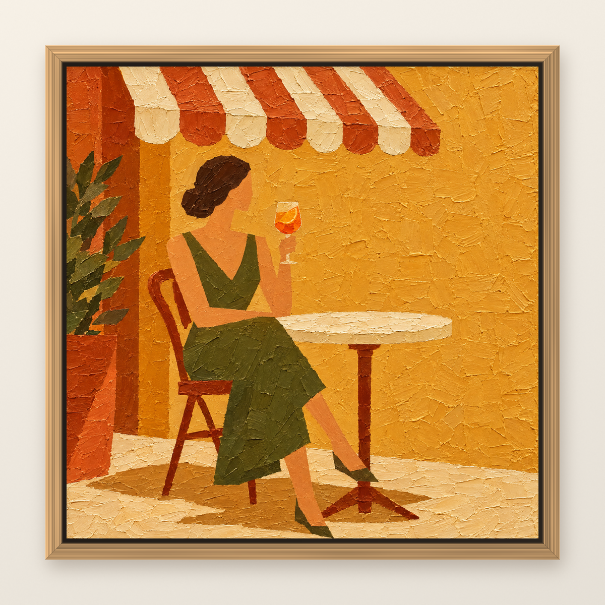 Cafe terrace oil painting of a woman with an orange spritz, shown in a slim oak floater frame on a warm white wall