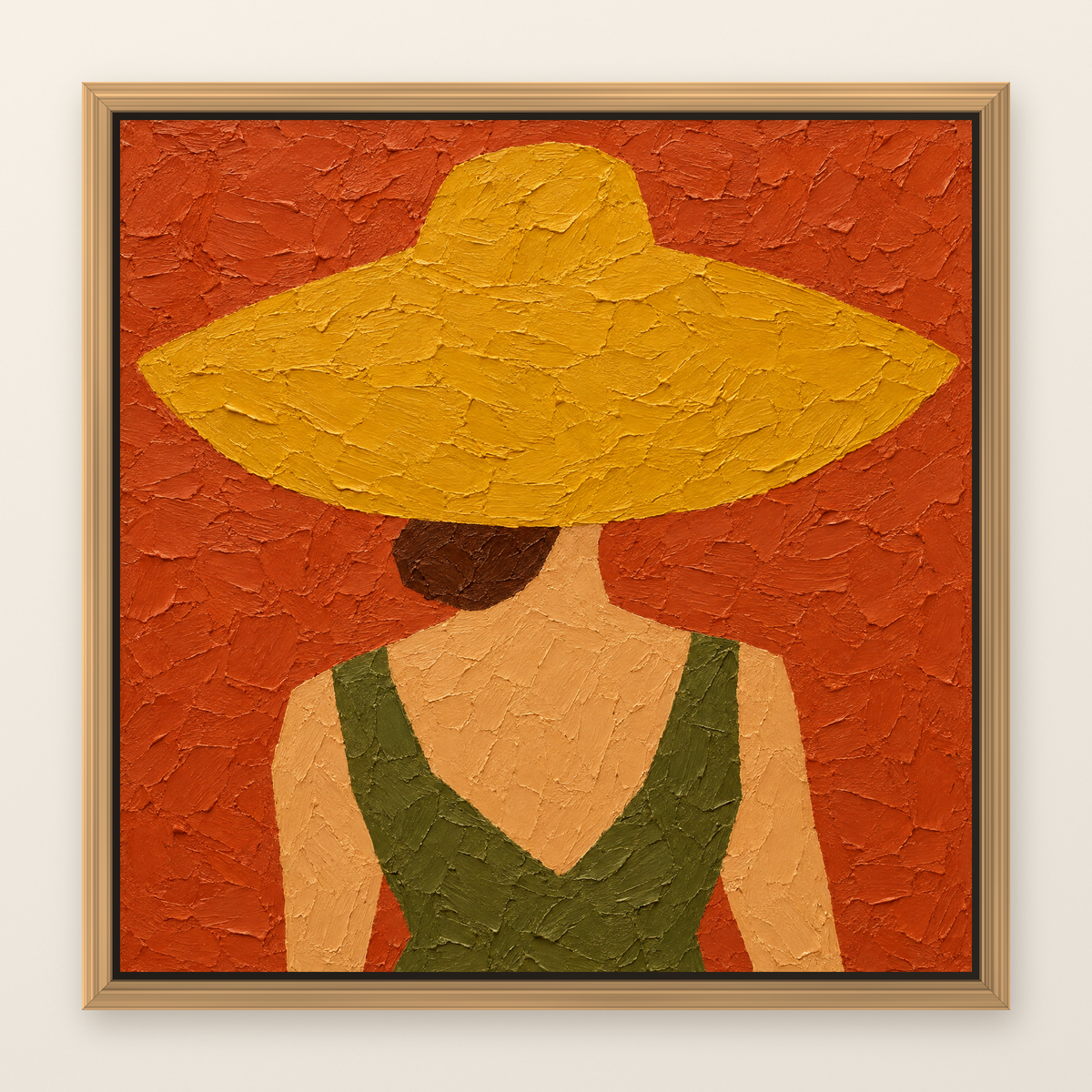 Oil painting of a woman in an oversized straw hat seen from behind, shown in a slim oak floater frame on a warm white wall